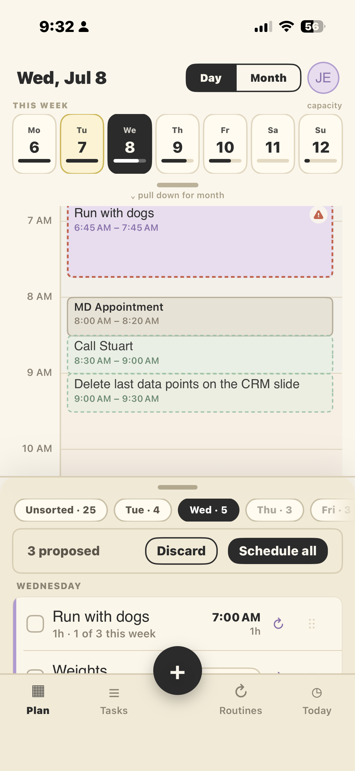 Day view after tapping Auto: proposed blocks placed around a real calendar appointment
